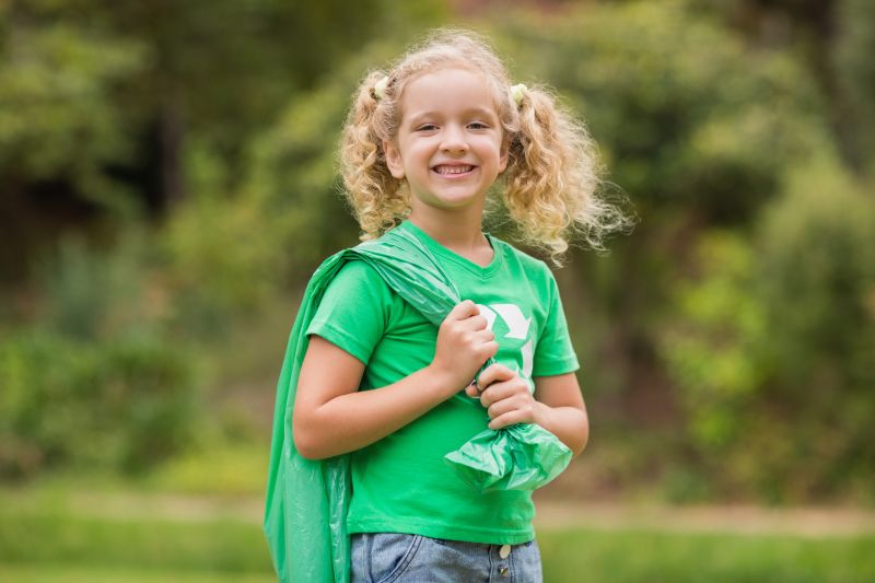 eco-friendly-little-girl-smiling-camera (1)